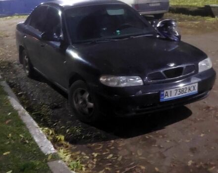 Черный Дэу Нубира, объемом двигателя 1.6 л и пробегом 503 тыс. км за 1313 $, фото 2 на Automoto.ua