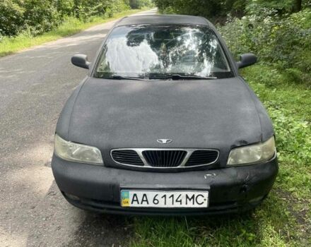 Черный Дэу Нубира, объемом двигателя 1.6 л и пробегом 230 тыс. км за 700 $, фото 1 на Automoto.ua