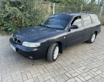 Черный Дэу Нубира, объемом двигателя 1.6 л и пробегом 258 тыс. км за 2000 $, фото 8 на Automoto.ua