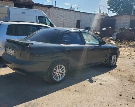 Чорний Деу Нубіра, об'ємом двигуна 1.6 л та пробігом 370 тис. км за 1200 $, фото 4 на Automoto.ua
