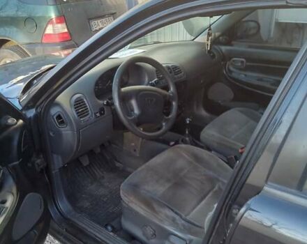 Чорний Деу Нубіра, об'ємом двигуна 1.6 л та пробігом 390 тис. км за 1100 $, фото 2 на Automoto.ua