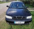 Черный Дэу Нубира, объемом двигателя 1.6 л и пробегом 200 тыс. км за 1314 $, фото 1 на Automoto.ua