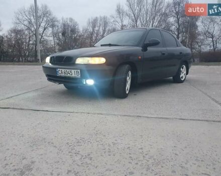 Черный Дэу Нубира, объемом двигателя 1.6 л и пробегом 261 тыс. км за 2500 $, фото 5 на Automoto.ua