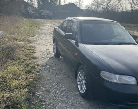 Чорний Деу Нубіра, об'ємом двигуна 1.6 л та пробігом 3 тис. км за 1100 $, фото 1 на Automoto.ua