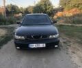 Черный Дэу Нубира, объемом двигателя 1.6 л и пробегом 200 тыс. км за 500 $, фото 1 на Automoto.ua