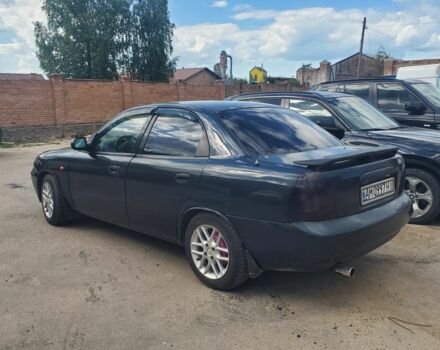 Чорний Деу Нубіра, об'ємом двигуна 1.6 л та пробігом 370 тис. км за 1200 $, фото 1 на Automoto.ua