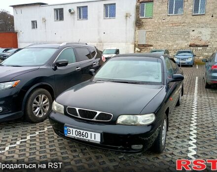 Черный Дэу Нубира, объемом двигателя 1.6 л и пробегом 190 тыс. км за 1250 $, фото 3 на Automoto.ua