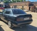 Чорний Деу Нубіра, об'ємом двигуна 1.6 л та пробігом 350 тис. км за 1500 $, фото 3 на Automoto.ua