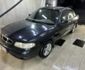 Черный Дэу Нубира, объемом двигателя 1.6 л и пробегом 330 тыс. км за 1300 $, фото 2 на Automoto.ua