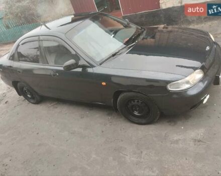 Черный Дэу Нубира, объемом двигателя 0 л и пробегом 310 тыс. км за 2000 $, фото 1 на Automoto.ua