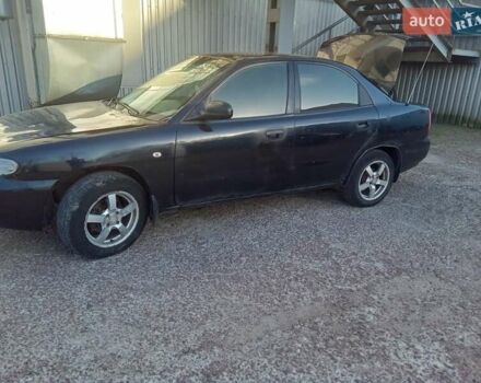 Чорний Деу Нубіра, об'ємом двигуна 1.6 л та пробігом 390 тис. км за 1100 $, фото 3 на Automoto.ua