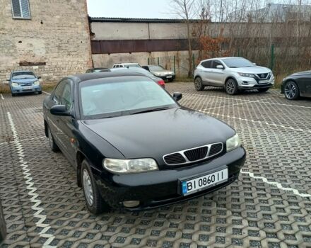 Чорний Деу Нубіра, об'ємом двигуна 1.6 л та пробігом 150 тис. км за 1250 $, фото 1 на Automoto.ua