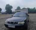 Черный Дэу Нубира, объемом двигателя 1.6 л и пробегом 2 тыс. км за 900 $, фото 1 на Automoto.ua