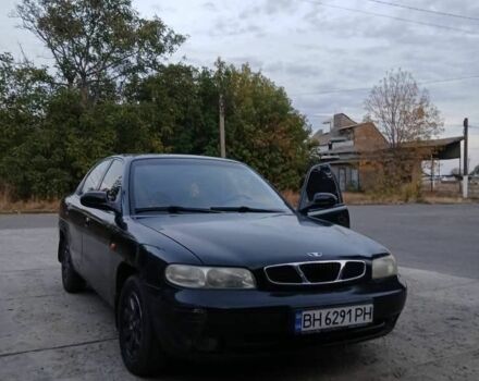 Черный Дэу Нубира, объемом двигателя 1.6 л и пробегом 300 тыс. км за 1000 $, фото 4 на Automoto.ua