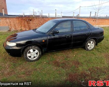 Чорний Деу Нубіра, об'ємом двигуна 1.6 л та пробігом 111 тис. км за 1111 $, фото 1 на Automoto.ua