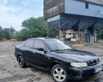 Черный Дэу Нубира, объемом двигателя 1.6 л и пробегом 2 тыс. км за 900 $, фото 1 на Automoto.ua