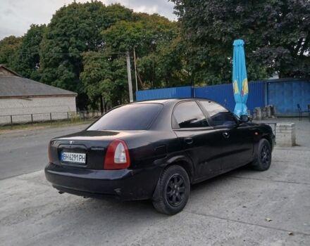 Черный Дэу Нубира, объемом двигателя 1.6 л и пробегом 300 тыс. км за 1000 $, фото 2 на Automoto.ua