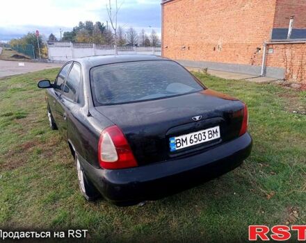 Чорний Деу Нубіра, об'ємом двигуна 1.6 л та пробігом 111 тис. км за 1111 $, фото 4 на Automoto.ua