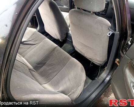 Чорний Деу Нубіра, об'ємом двигуна 1.6 л та пробігом 111 тис. км за 1111 $, фото 7 на Automoto.ua