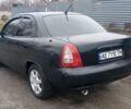 Черный Дэу Нубира, объемом двигателя 1.6 л и пробегом 3 тыс. км за 1650 $, фото 2 на Automoto.ua