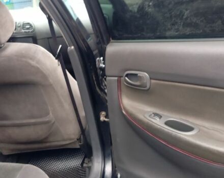 Черный Дэу Нубира, объемом двигателя 1.6 л и пробегом 3 тыс. км за 1650 $, фото 11 на Automoto.ua