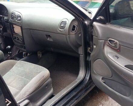 Черный Дэу Нубира, объемом двигателя 1.6 л и пробегом 3 тыс. км за 1650 $, фото 9 на Automoto.ua