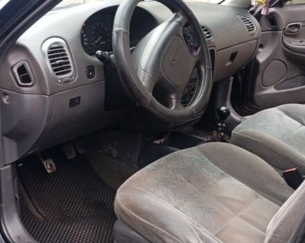 Черный Дэу Нубира, объемом двигателя 1.6 л и пробегом 3 тыс. км за 1650 $, фото 14 на Automoto.ua