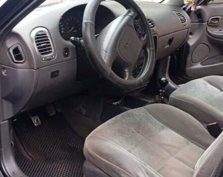 Чорний Деу Нубіра, об'ємом двигуна 1.6 л та пробігом 220 тис. км за 1600 $, фото 6 на Automoto.ua