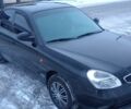 Черный Дэу Нубира, объемом двигателя 2 л и пробегом 350 тыс. км за 1550 $, фото 1 на Automoto.ua
