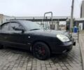 Черный Дэу Нубира, объемом двигателя 2 л и пробегом 200 тыс. км за 3000 $, фото 1 на Automoto.ua