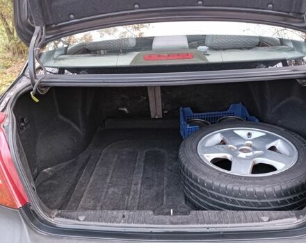 Черный Дэу Нубира, объемом двигателя 1.8 л и пробегом 302 тыс. км за 2700 $, фото 4 на Automoto.ua