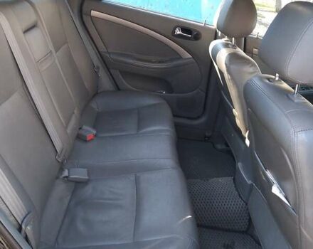 Черный Дэу Нубира, объемом двигателя 1.6 л и пробегом 255 тыс. км за 5000 $, фото 1 на Automoto.ua