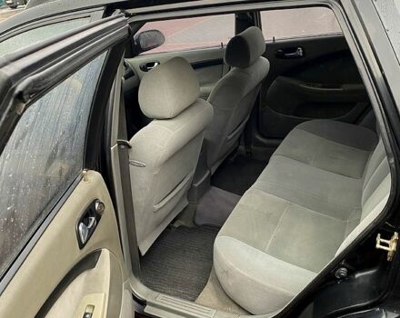 Черный Дэу Нубира, объемом двигателя 1.6 л и пробегом 500 тыс. км за 3500 $, фото 3 на Automoto.ua