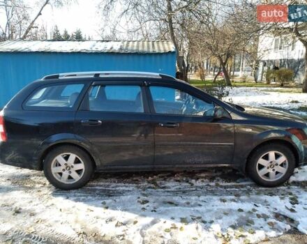 Черный Дэу Нубира, объемом двигателя 1.6 л и пробегом 255 тыс. км за 5000 $, фото 2 на Automoto.ua