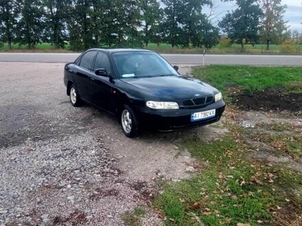 Черный Дэу Нубира, объемом двигателя 1.6 л и пробегом 503 тыс. км за 1313 $, фото 1 на Automoto.ua