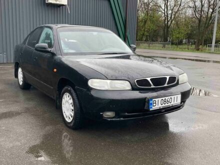 Черный Дэу Нубира, объемом двигателя 1.6 л и пробегом 190 тыс. км за 1399 $, фото 1 на Automoto.ua