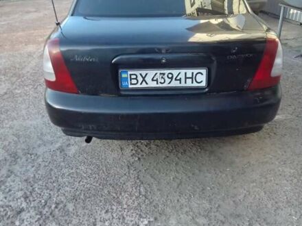 Черный Дэу Нубира, объемом двигателя 1.6 л и пробегом 390 тыс. км за 1100 $, фото 1 на Automoto.ua