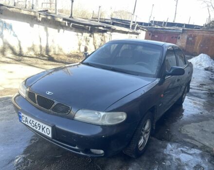 Черный Дэу Нубира, объемом двигателя 1.6 л и пробегом 250 тыс. км за 650 $, фото 1 на Automoto.ua