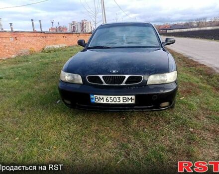 Чорний Деу Нубіра, об'ємом двигуна 1.6 л та пробігом 111 тис. км за 1111 $, фото 1 на Automoto.ua