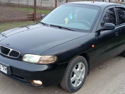 Чорний Деу Нубіра, об'ємом двигуна 1.6 л та пробігом 220 тис. км за 1600 $, фото 1 на Automoto.ua