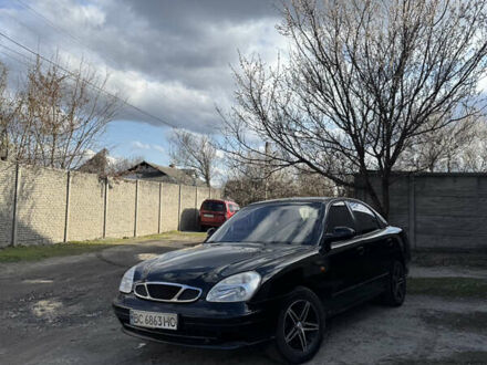 Деу Нубіра 2001 у Харкові на Automoto.ua Чорний Деу Нубіра, об'ємом двигуна 2 л та пробігом 414 тис. км за 1800 $, фото 1 на Automoto.ua