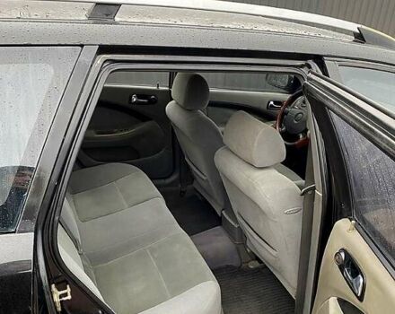 Черный Дэу Нубира, объемом двигателя 1.6 л и пробегом 500 тыс. км за 3500 $, фото 1 на Automoto.ua