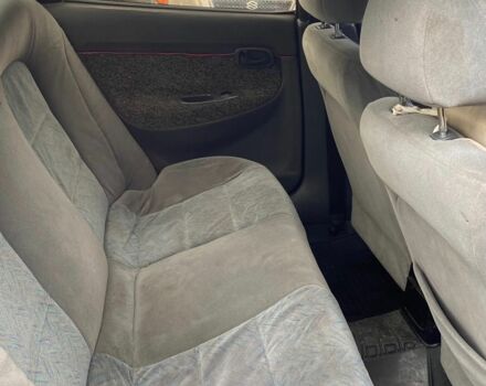 Красный Дэу Нубира, объемом двигателя 1.6 л и пробегом 180 тыс. км за 1050 $, фото 4 на Automoto.ua