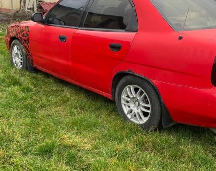 Красный Дэу Нубира, объемом двигателя 1.6 л и пробегом 180 тыс. км за 1050 $, фото 2 на Automoto.ua