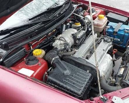 Червоний Деу Нубіра, об'ємом двигуна 1.6 л та пробігом 201 тис. км за 1650 $, фото 13 на Automoto.ua