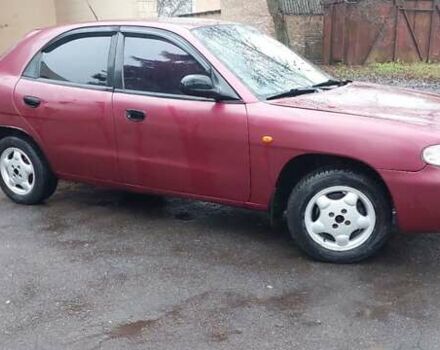 Червоний Деу Нубіра, об'ємом двигуна 1.6 л та пробігом 201 тис. км за 1650 $, фото 1 на Automoto.ua