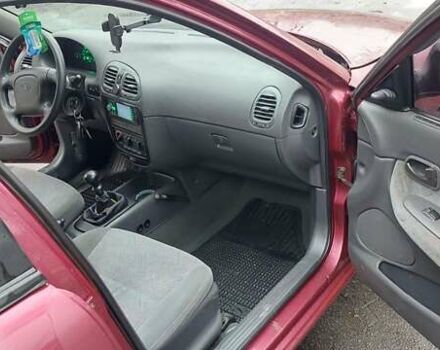 Червоний Деу Нубіра, об'ємом двигуна 1.6 л та пробігом 201 тис. км за 1650 $, фото 10 на Automoto.ua