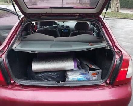 Червоний Деу Нубіра, об'ємом двигуна 1.6 л та пробігом 201 тис. км за 1650 $, фото 12 на Automoto.ua