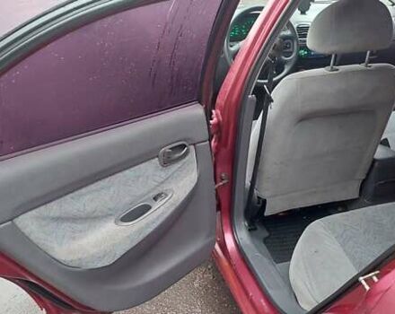 Червоний Деу Нубіра, об'ємом двигуна 1.6 л та пробігом 201 тис. км за 1650 $, фото 9 на Automoto.ua