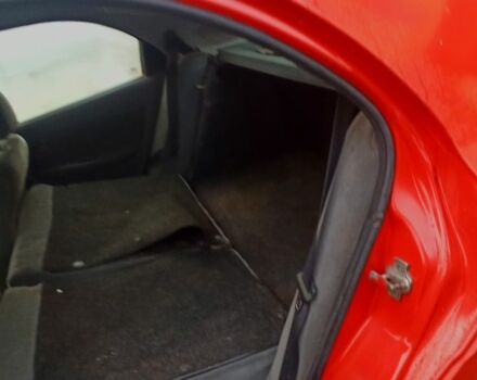 Деу Нубіра 1998 у Люботине на Automoto.ua Червоний Деу Нубіра, об'ємом двигуна 1.6 л та пробігом 225 тис. км за 1800 $, фото 9 на Automoto.ua